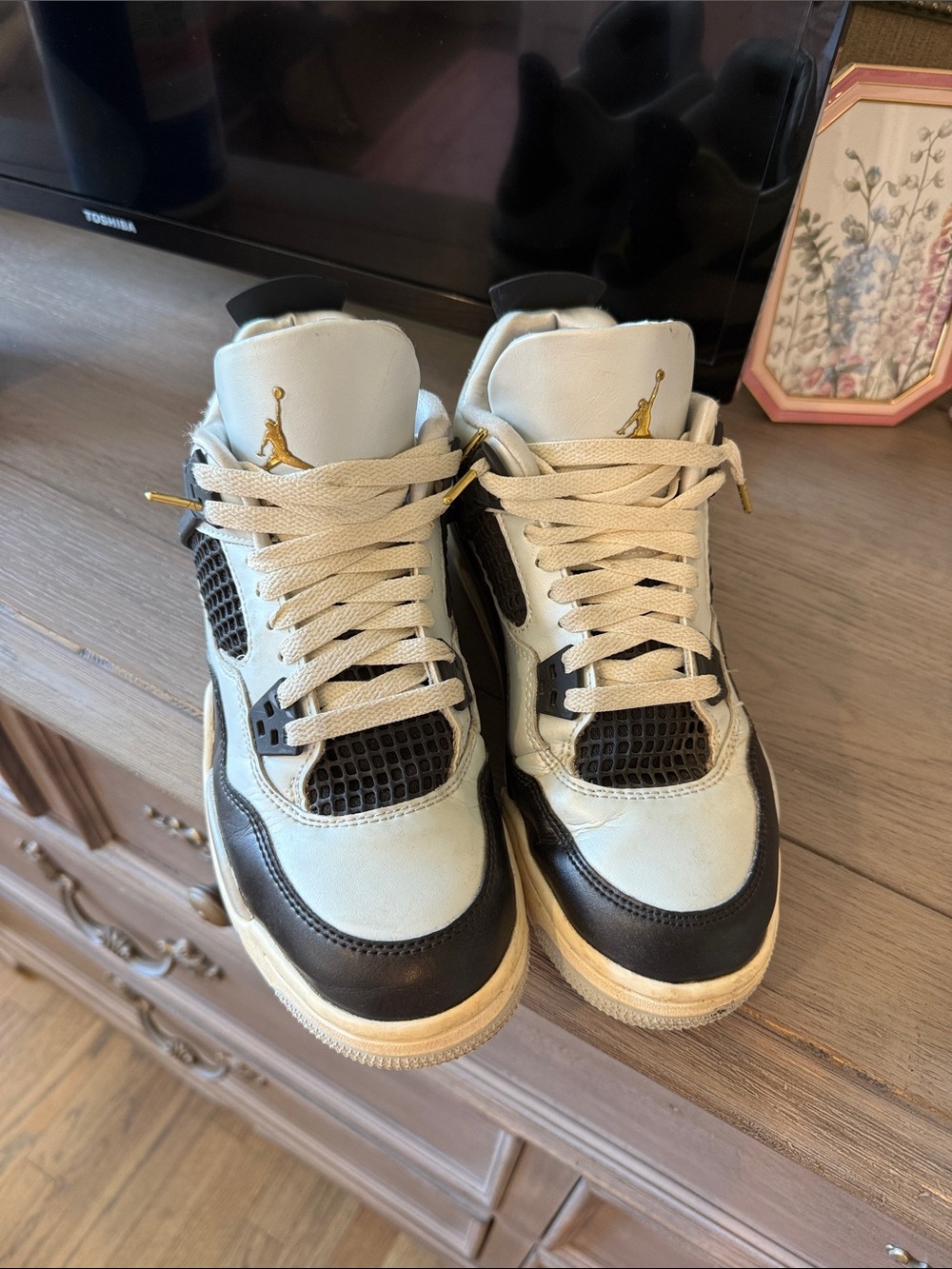 Jordan High-Top Sneakers in White, Black and Gold Accents
